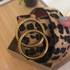 Never worn animal print belt. In original box